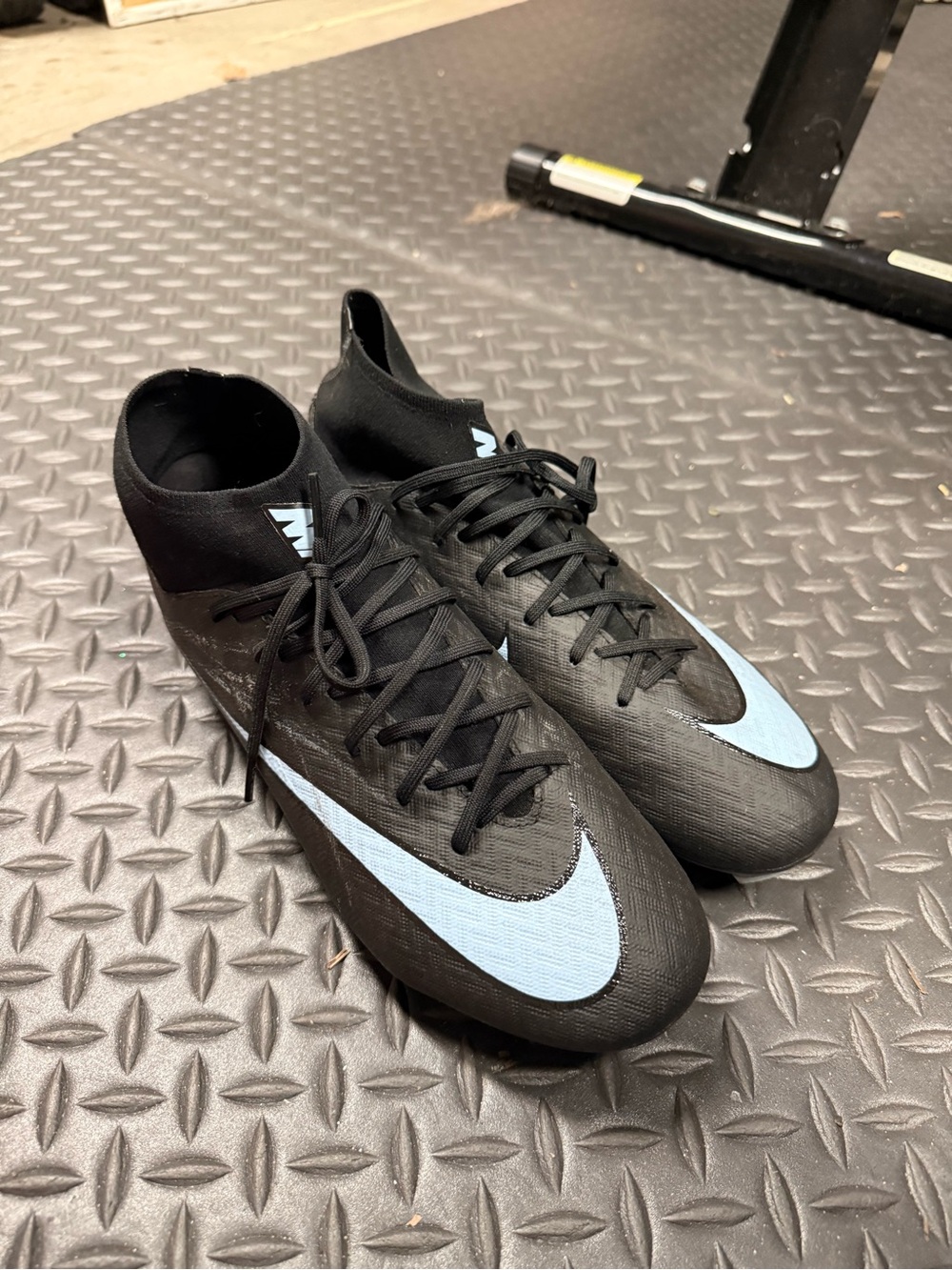 Nike Men’s Black Soccer Cleats with Light Blue Swoosh